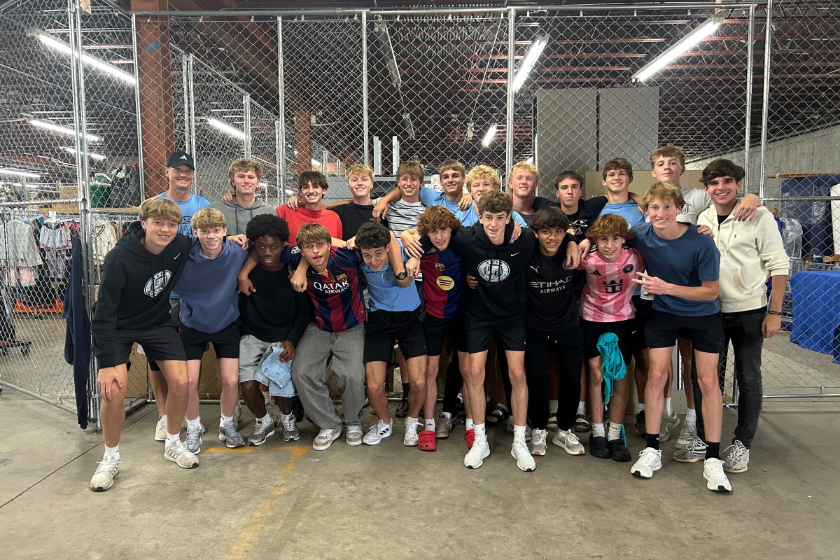 GRCHS Varsity Boys Soccer team at New 2 You in Grand Rapids